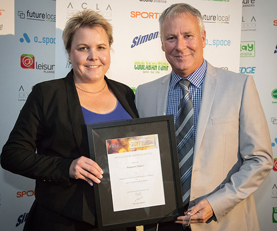 Associate Professor Rochelle Eime accepting the Parks and Leisure Australia Award of Excellence in the Research Project category