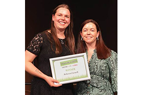 Rebecca, left, accepts her Trailblazer award at LambEx conference